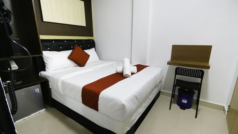 Imagen de la habitación del Hotel Red Velvet Inn. Foto 19