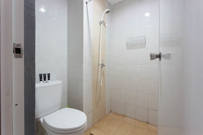 Imagen de la habitación del Hotel RedDoorz Apartment @ Taman Melati Margonda. Foto 17