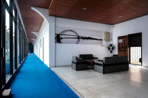 Imagen general del Hotel RedDoorz @ Cempaka Putih Jambi. Foto 8