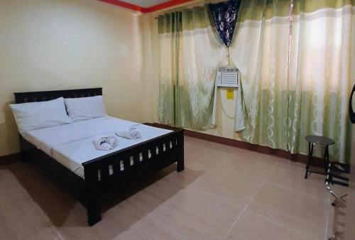 Imagen de la habitación del Hotel RedDoorz @ Johsons Pension House Butuan City. Foto 7