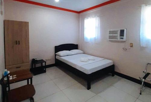 Imagen general del Hotel RedDoorz @ Johsons Pension House Butuan City. Foto 5