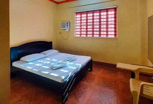 Imagen de la habitación del Hotel RedDoorz @ Johsons Pension House Butuan City. Foto 8