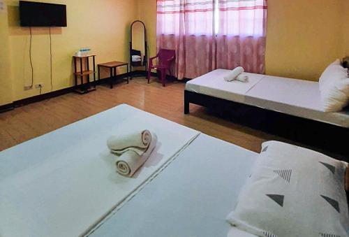 Imagen de la habitación del Hotel RedDoorz @ Johsons Pension House Butuan City. Foto 11