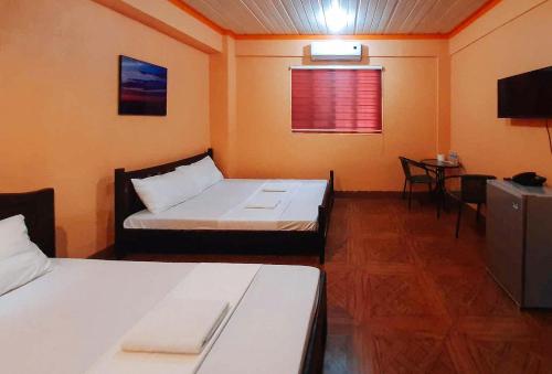Imagen de la habitación del Hotel RedDoorz @ Johsons Pension House Butuan City. Foto 12