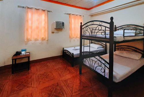 Imagen de la habitación del Hotel RedDoorz @ Johsons Pension House Butuan City. Foto 13