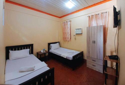 Imagen de la habitación del Hotel RedDoorz @ Johsons Pension House Butuan City. Foto 15