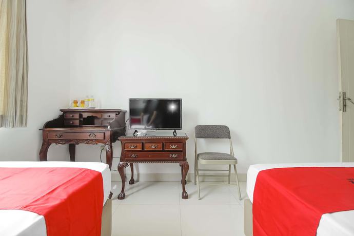 Imagen de la habitación del Hotel RedDoorz @ Permata Sari Karawaci. Foto 11