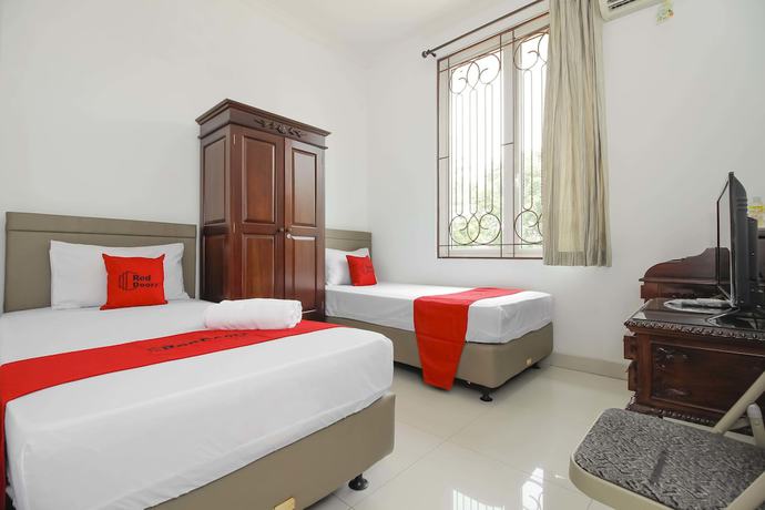 Imagen de la habitación del Hotel RedDoorz @ Permata Sari Karawaci. Foto 14