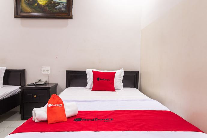 Imagen de la habitación del Hotel RedDoorz @ Phan Huy Ich street. Foto 7