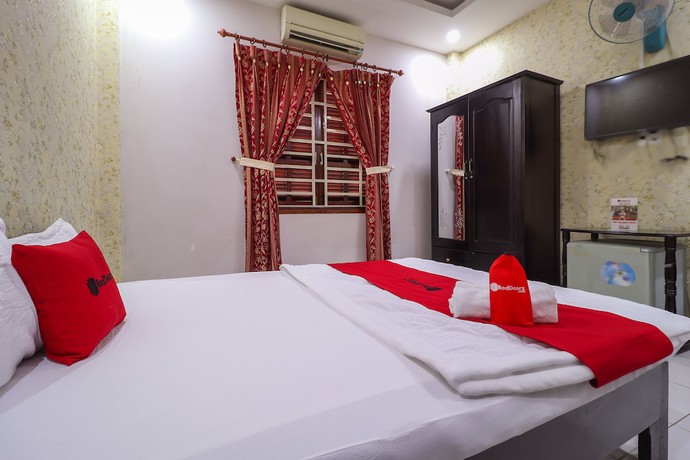 Imagen de la habitación del Hotel RedDoorz @ Phan Huy Ich street. Foto 10