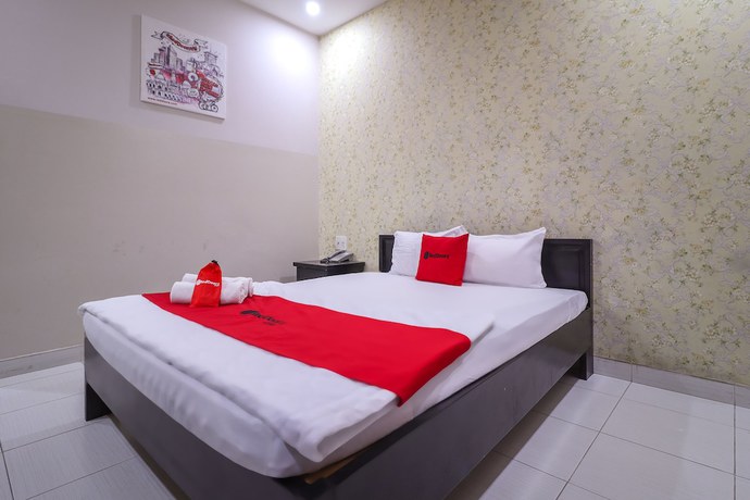 Imagen de la habitación del Hotel RedDoorz @ Phan Huy Ich street. Foto 13