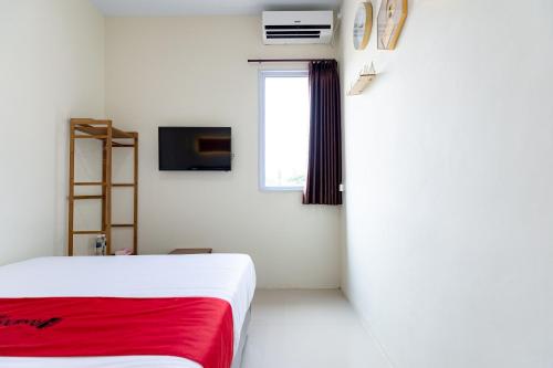 Imagen general del Hotel RedDoorz Plus @ Komplek ABC Batu Aji. Foto 1