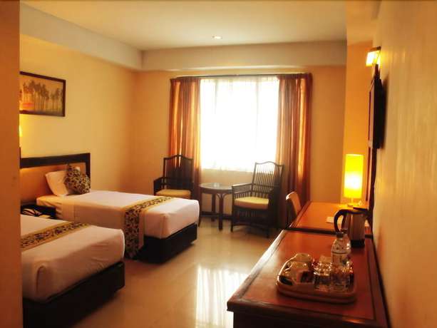 Imagen de la habitación del Hotel RedDoorz Plus @ Losari Beach. Foto 14
