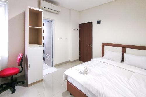 Imagen de la habitación del Hotel RedDoorz Plus Near ICE BSD Minerva. Foto 20