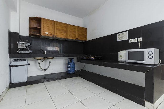 Imagen de la habitación del Hotel RedDoorz Plus @ Pasar Baru. Foto 7