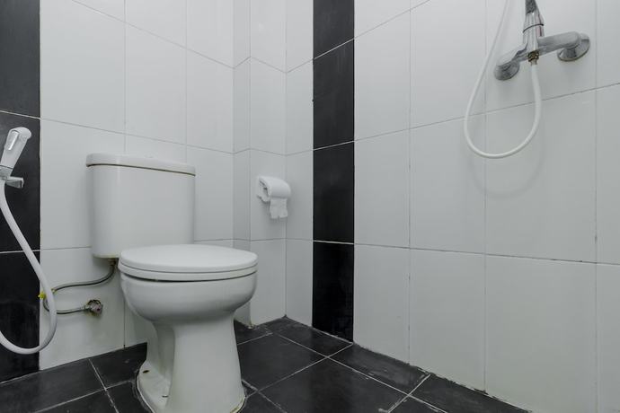 Imagen de la habitación del Hotel RedDoorz Plus @ Pasar Baru. Foto 8