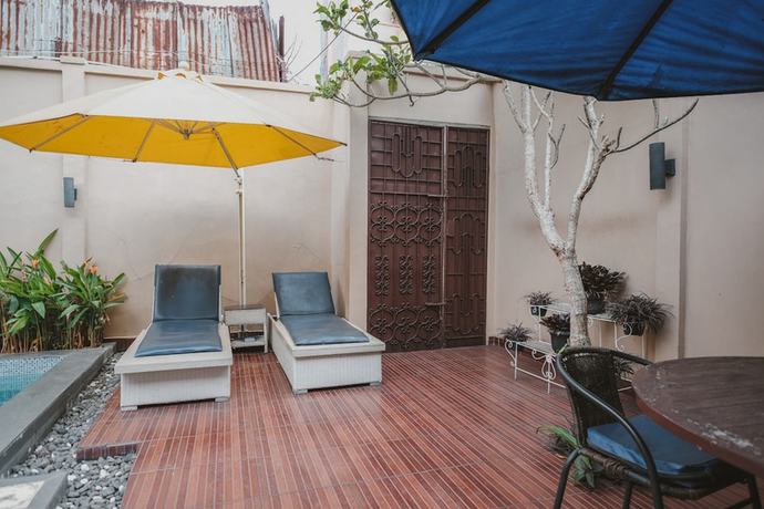 Imagen de la piscina del Hotel RedDoorz Plus @ Tanjung Karang Lampung 2. Foto 20