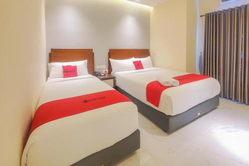 Imagen de la habitación del Hotel RedDoorz Plus @ UNO Jalan Merak Samarinda. Foto 14