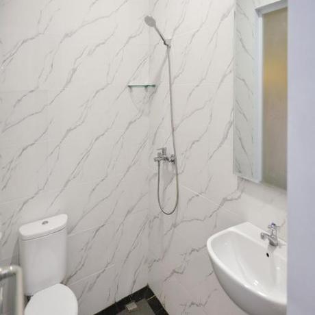 Imagen de la habitación del Hotel RedDoorz Plus at Lotus Residence. Foto 17