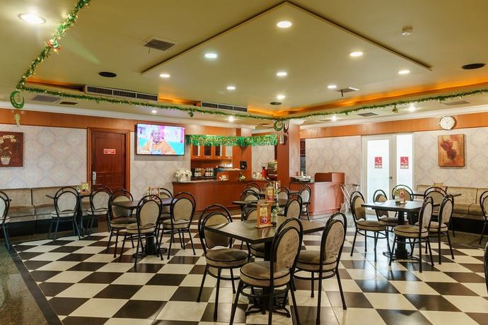 Imagen del bar/restaurante del Hotel RedDoorz Plus near Dunia Fantasi Ancol. Foto 3