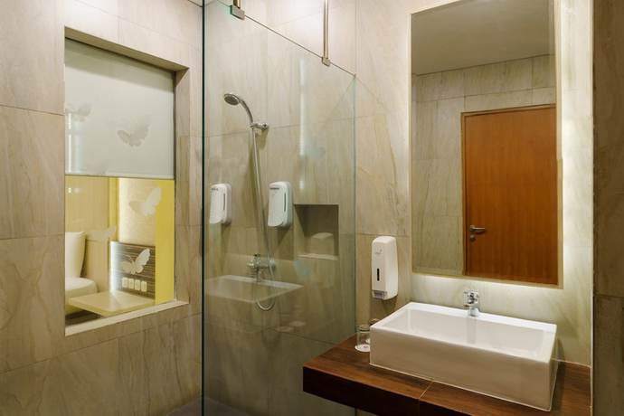Imagen de la habitación del Hotel RedDoorz Plus near Dunia Fantasi Ancol. Foto 11