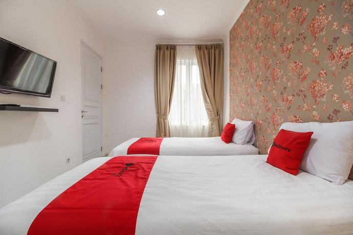 Imagen de la habitación del Hotel RedDoorz Plus near Exit Toll Puncak 2. Foto 8