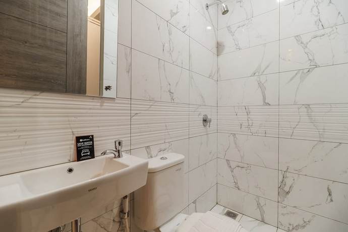 Imagen de la habitación del Hotel RedDoorz Plus near Senayan City - Hostel. Foto 16