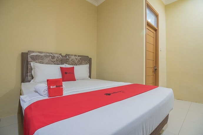 Imagen de la habitación del Hotel RedDoorz Plus near Syamsudin Noor Airport 3. Foto 20