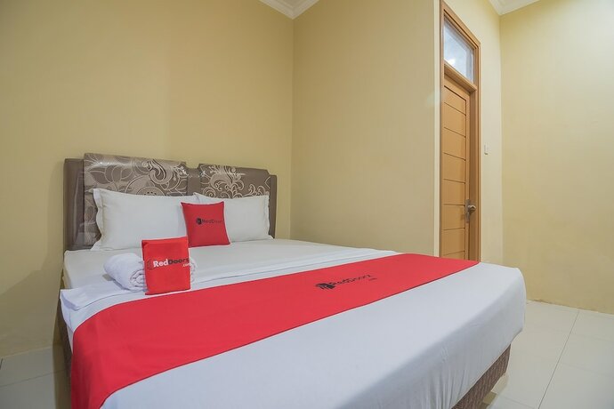 Imagen de la habitación del Hotel RedDoorz Plus near Syamsudin Noor Airport 3. Foto 22
