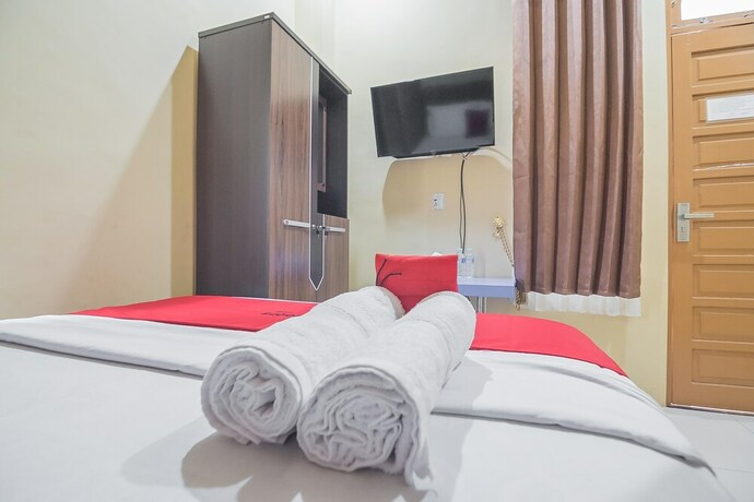 Imagen de la habitación del Hotel RedDoorz Plus near Syamsudin Noor Airport 3. Foto 30