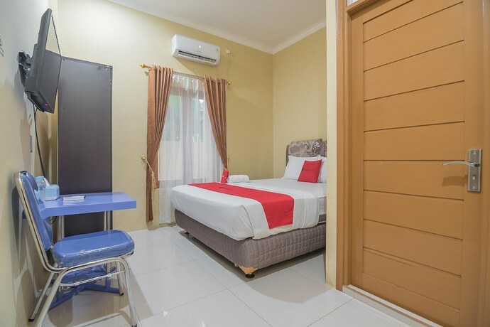 Imagen de la habitación del Hotel RedDoorz Plus near Syamsudin Noor Airport 3. Foto 31