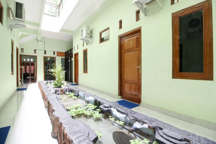 Imagen de la habitación del Hotel RedDoorz Plus near Taman Sari. Foto 8