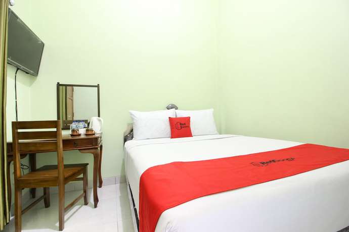 Imagen de la habitación del Hotel RedDoorz Plus near Taman Sari. Foto 11