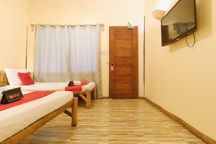 Imagen de la habitación del Hotel RedDoorz Plus near Vigan Convention Center. Foto 3