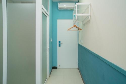 Imagen de la habitación del Hotel RedDoorz Premium @ Griya Inkoppabri Cisarua Puncak. Foto 18