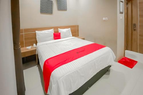 Imagen de la habitación del Hotel RedDoorz Premium @ Griya Inkoppabri Cisarua Puncak. Foto 20