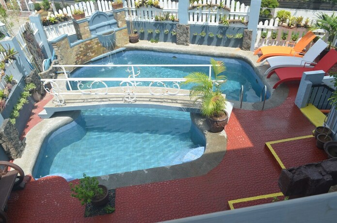 Imagen general del Hotel RedDoorz Premium at THE GRAND PENINSULA SUITES. Foto 1