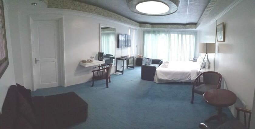 Imagen de la habitación del Hotel RedDoorz Premium at THE GRAND PENINSULA SUITES. Foto 19