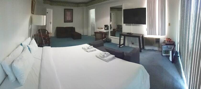 Imagen de la habitación del Hotel RedDoorz Premium at THE GRAND PENINSULA SUITES. Foto 21