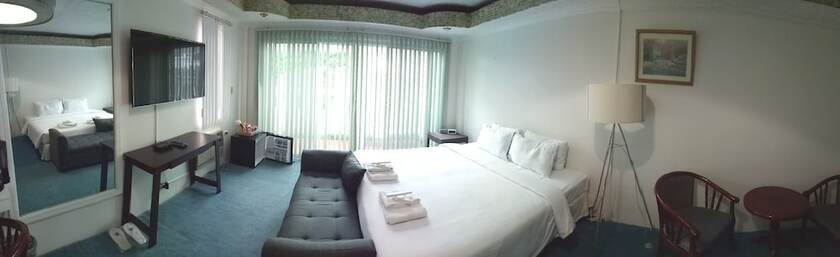 Imagen de la habitación del Hotel RedDoorz Premium at THE GRAND PENINSULA SUITES. Foto 31