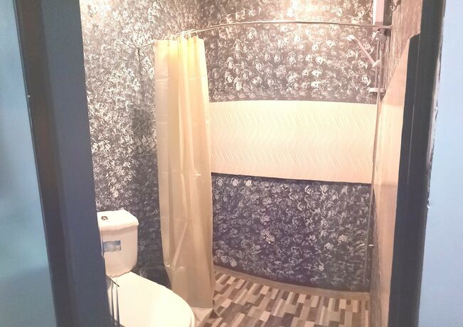 Imagen de la habitación del Hotel RedDoorz Premium at THE GRAND PENINSULA SUITES. Foto 34