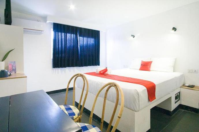 Imagen de la habitación del Hotel RedDoorz Premium near Senggigi Beach. Foto 2