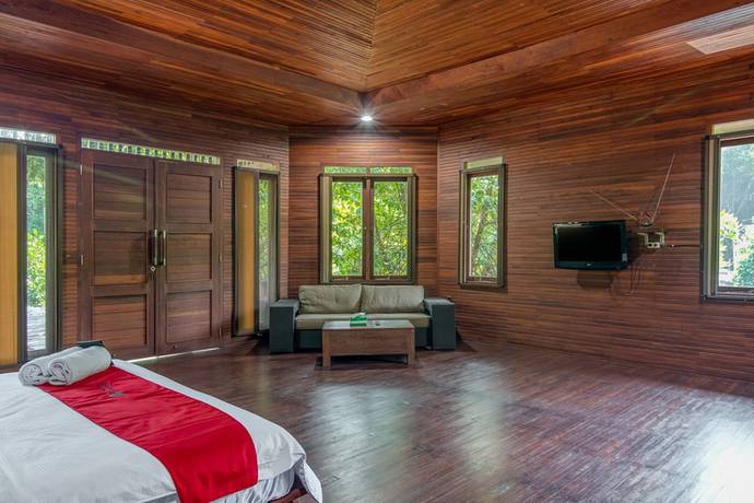 Imagen de la habitación del Hotel RedDoorz Resort @ Taman Wisata Mangrove. Foto 12