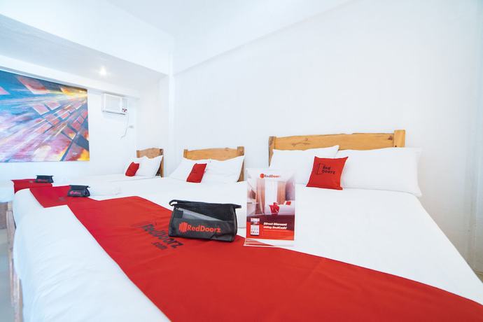 Imagen de la habitación del Hotel RedDoorz @ Sabang Beach Baler. Foto 11