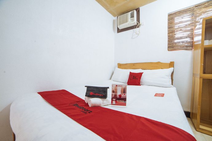 Imagen de la habitación del Hotel RedDoorz @ Sabang Beach Baler. Foto 12