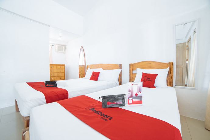 Imagen de la habitación del Hotel RedDoorz @ Sabang Beach Baler. Foto 16