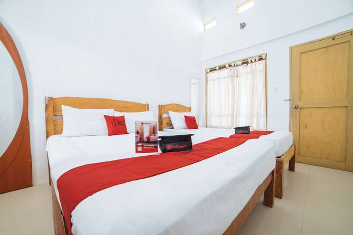 Imagen de la habitación del Hotel RedDoorz @ Sabang Beach Baler. Foto 17
