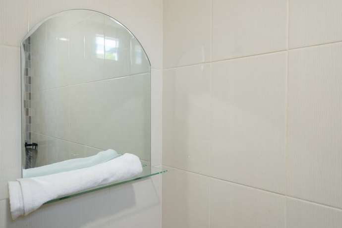 Imagen de la habitación del Hotel RedDoorz Syariah @ Panglima Polem Aceh. Foto 9