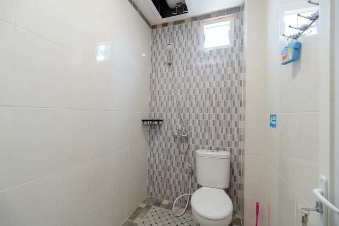 Imagen de la habitación del Hotel RedDoorz Syariah @ Panglima Polem Aceh. Foto 10