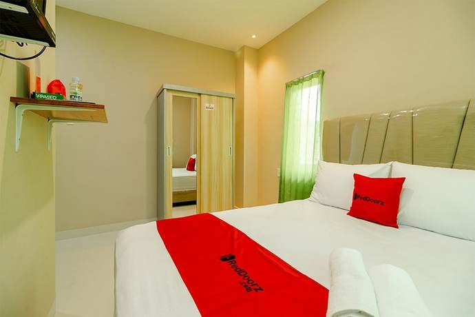 Imagen de la habitación del Hotel RedDoorz Syariah @ Panglima Polem Aceh. Foto 11